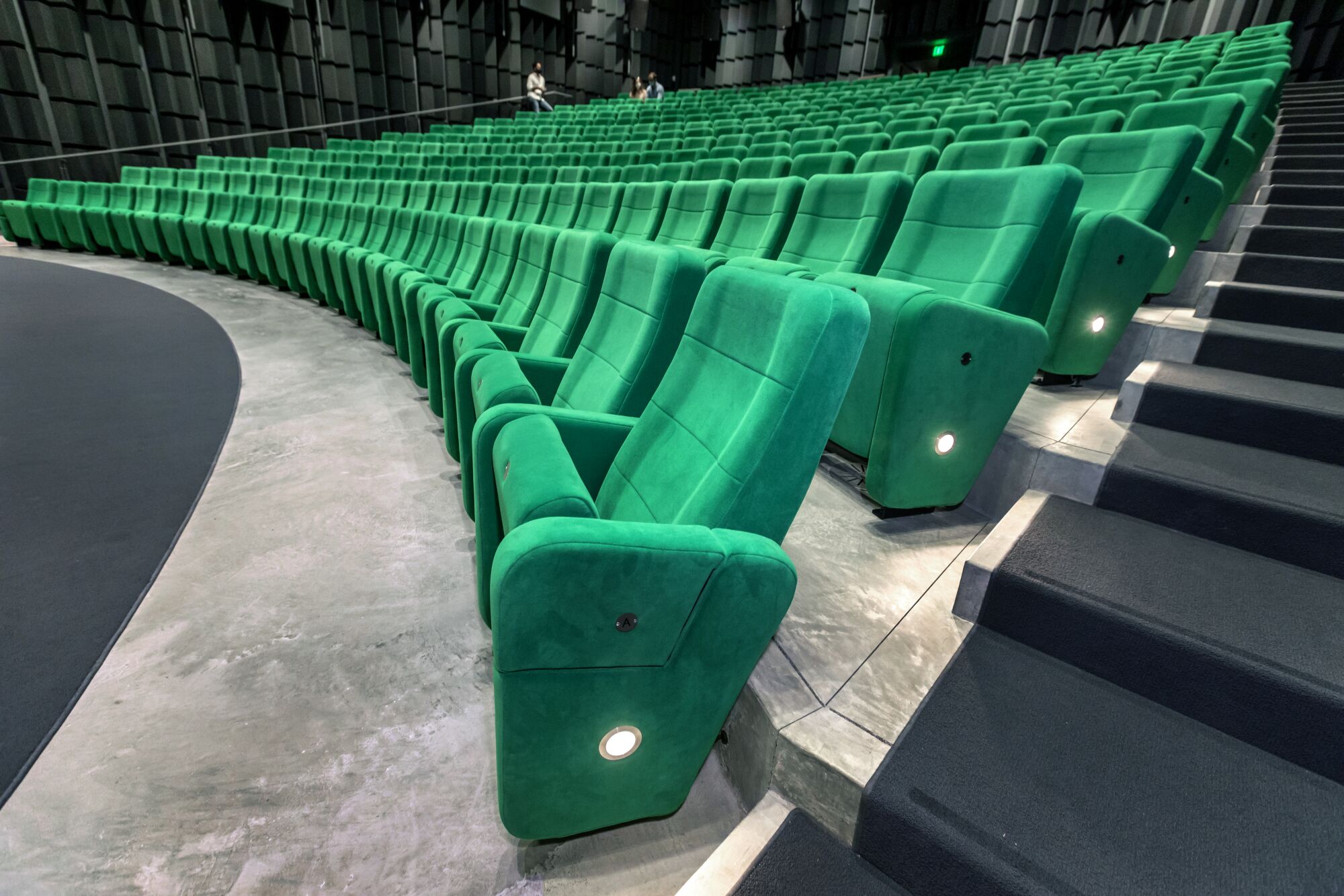 Green seats in Ted Mann Theater at the new Academy Museum of Motion Pictures.