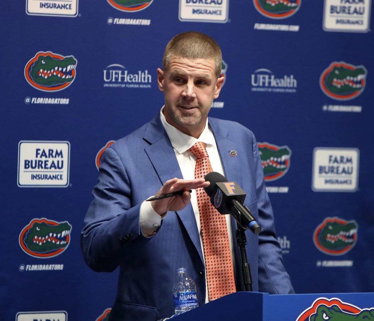 Florida head football coach Billy Napier speaks to the media during his introductory NCAA college football news conference at Ben Hill Griffin Stadium in Gainesville, Fla., Sunday, Dec. 5, 2021. (Brad McClenny/The Gainesville Sun via AP)