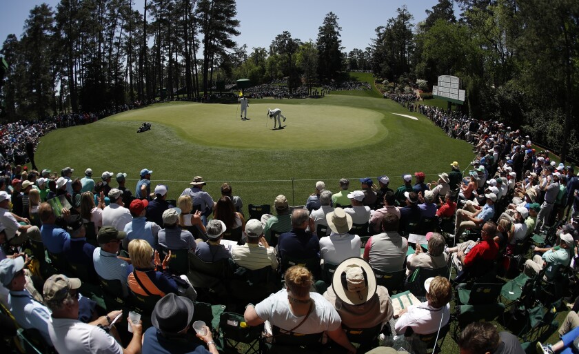 FILE - In this April 5, 2018, file photo, Bubba Watson putts on the sixth hole during the first round at the Masters golf tournament in Augusta, Ga. The sixth hole is statistically the easiest of the par-3s at Augusta National. (AP Photo/Charlie Riedel, File)