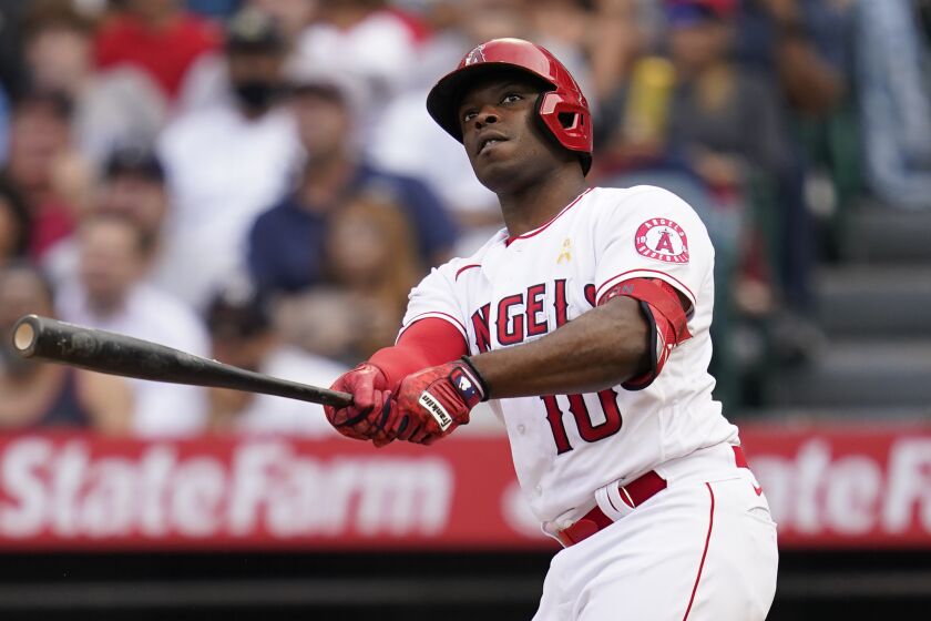 Los Angeles Angels' Justin Upton (10) hits a foul ball during a baseball game against the New York Yankees.