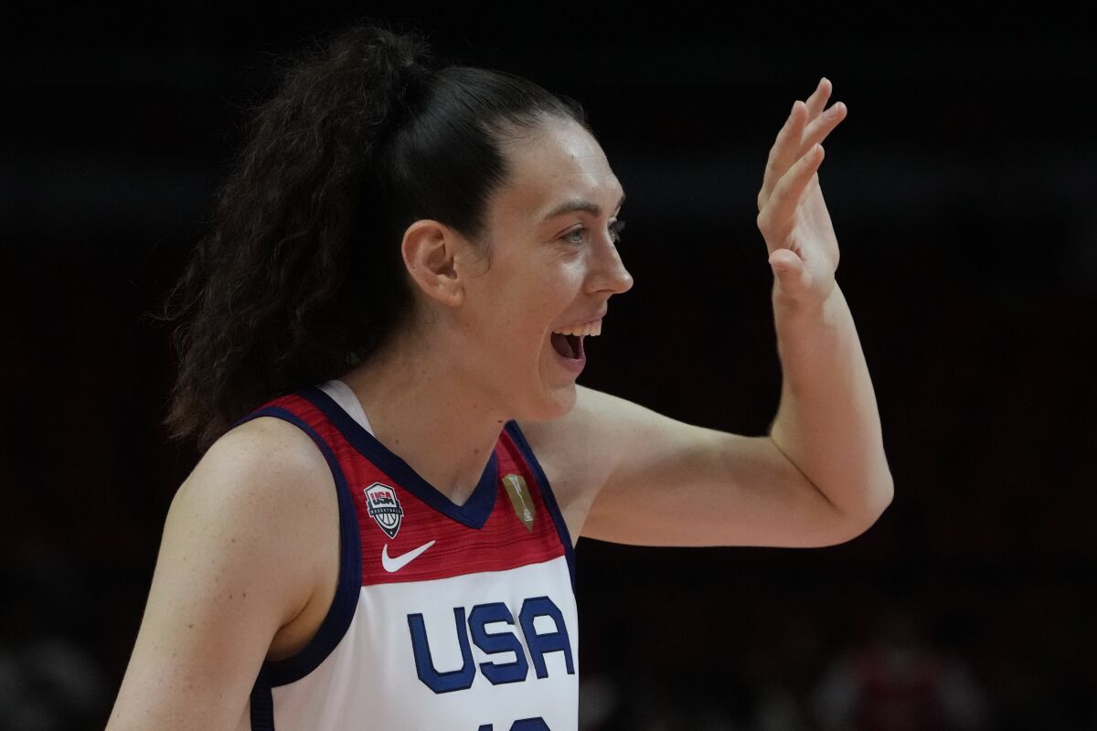 United States' Breanna Stewart waves to a supporter in the crowd following their win over Bosnia and Herzegovina at the women's Basketball World Cup in Sydney, Australia, Tuesday, Sept. 27, 2022. (AP Photo/Mark Baker)