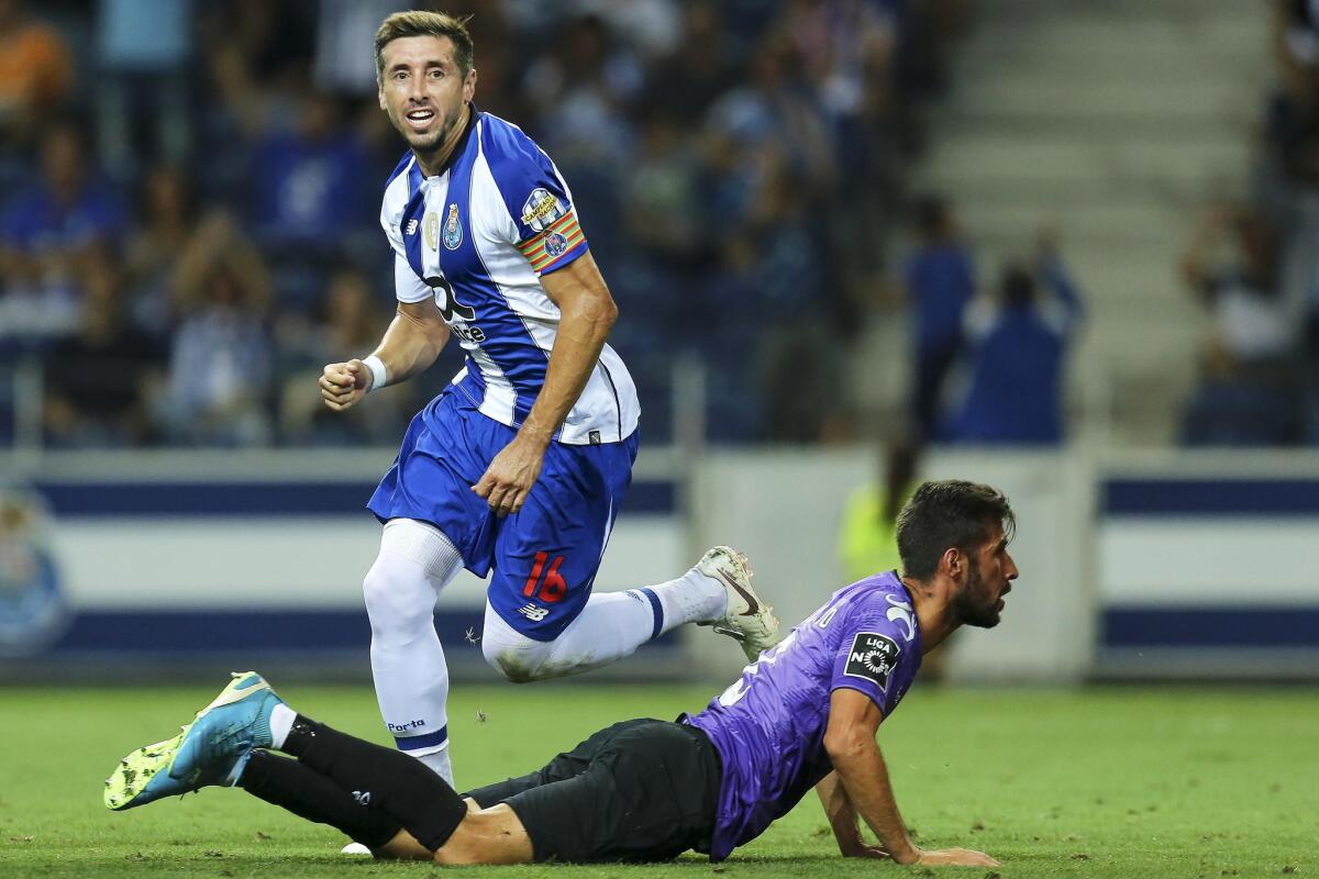 FC Porto's Hector Herrera (L) celebrates after scoring the opening goal during the Portuguese First League soccer match between FC Porto and Moreirense FC in Porto, Portugal, 02 September 2018.