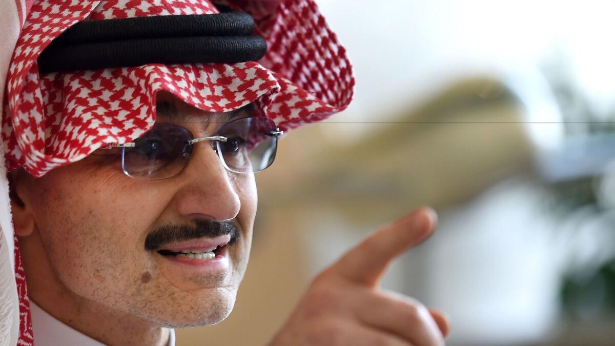 Saudi Arabia's Prince Alwaleed bin Talal speaks to reporters during a news conference in the Saudi capital of Riyadh on July 1, 2015.