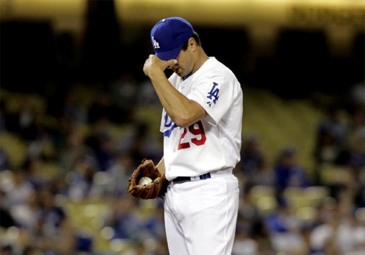 Dodgers' Ted Lilly gave up five runs (four earned) on eight hits over three innings.