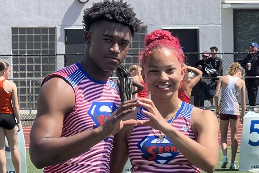 Gardena Serra's Rodrick Pleasant (left) and Brazil Neal, defending state champions in the 200.