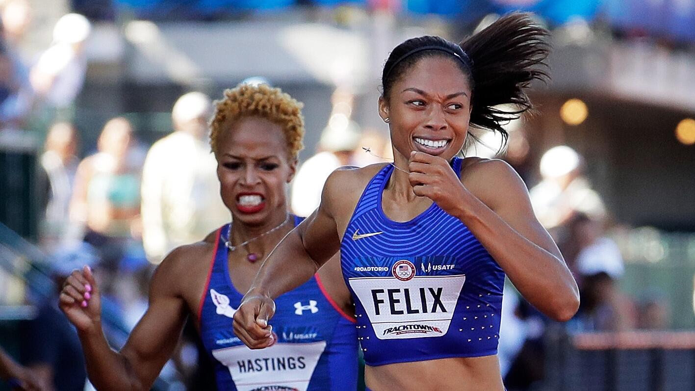 Allyson Felix runs to victory ahead of Natasha Hastings in the Women's 400 Meters Final.