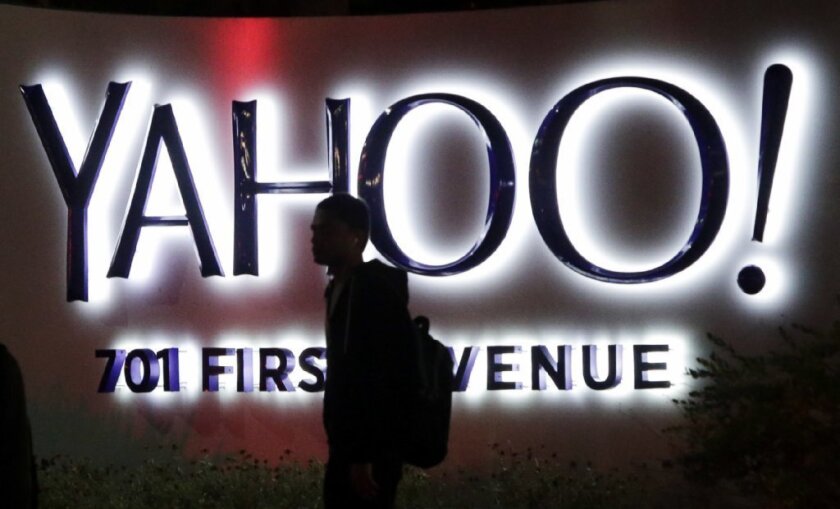 Cutting costs helped Yahoo post a profit in the fourth quarter, but the company's net revenue slipped yet again.