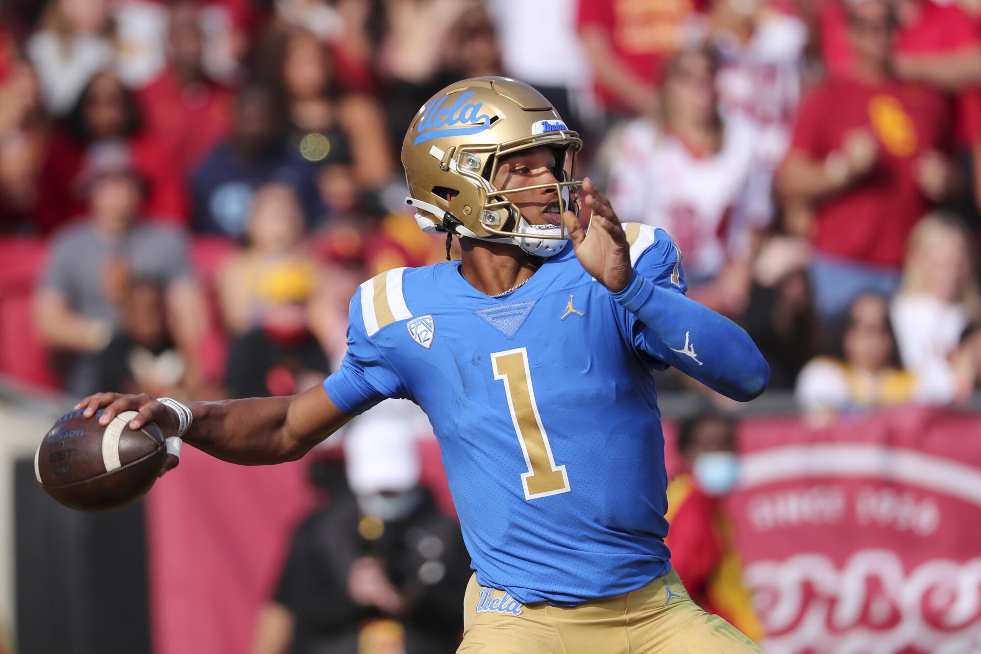 UCLA quarterback Dorian Thompson-Robinson passes against USC in November.