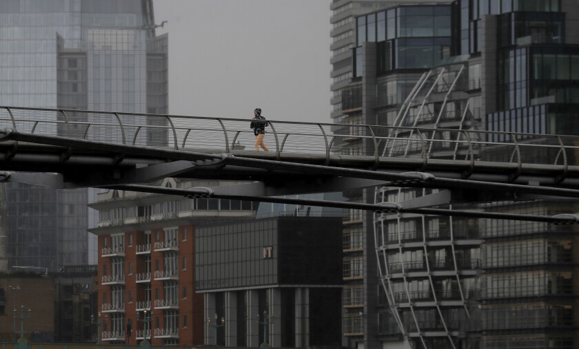 A runner on London's Millennium Bridge 