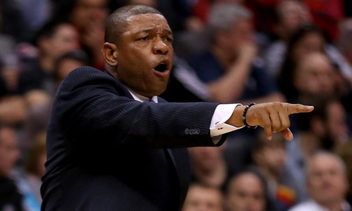 Clippers Coach Doc Rivers instructs his players during a win over the Phoenix Suns on March 10. Rivers says its difficult to prepare for the Clippers' first-round playoff opponent since there are several possible teams they could face.