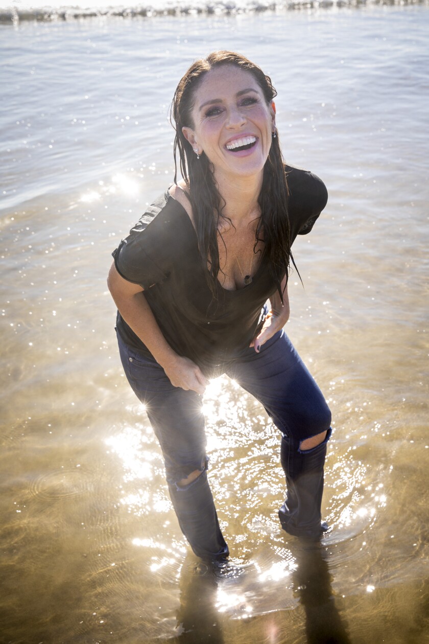 Soleil Moon Frye enjoys the water at Venice Beach.