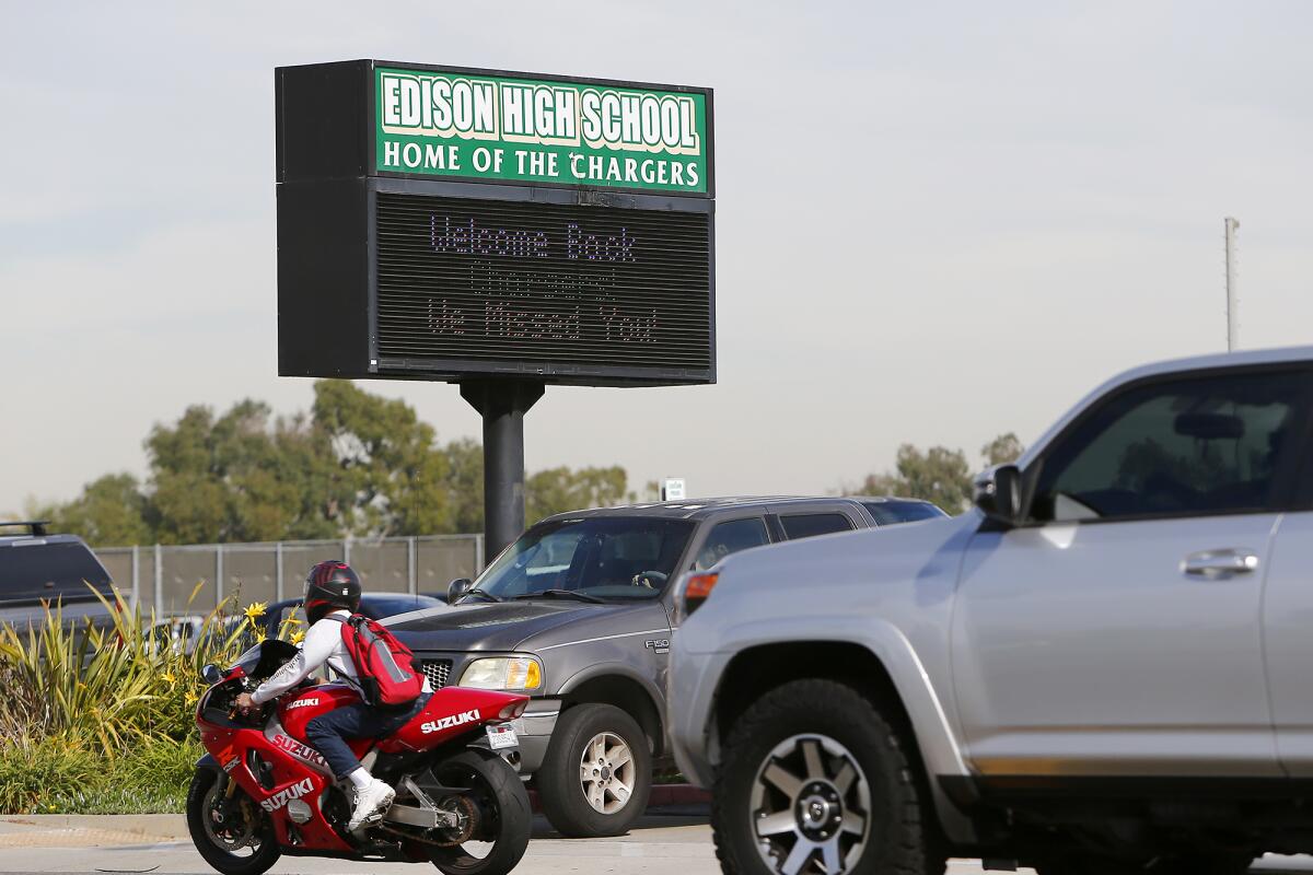 A digital sign welcomes students back to Edison High School in Huntington Beach.