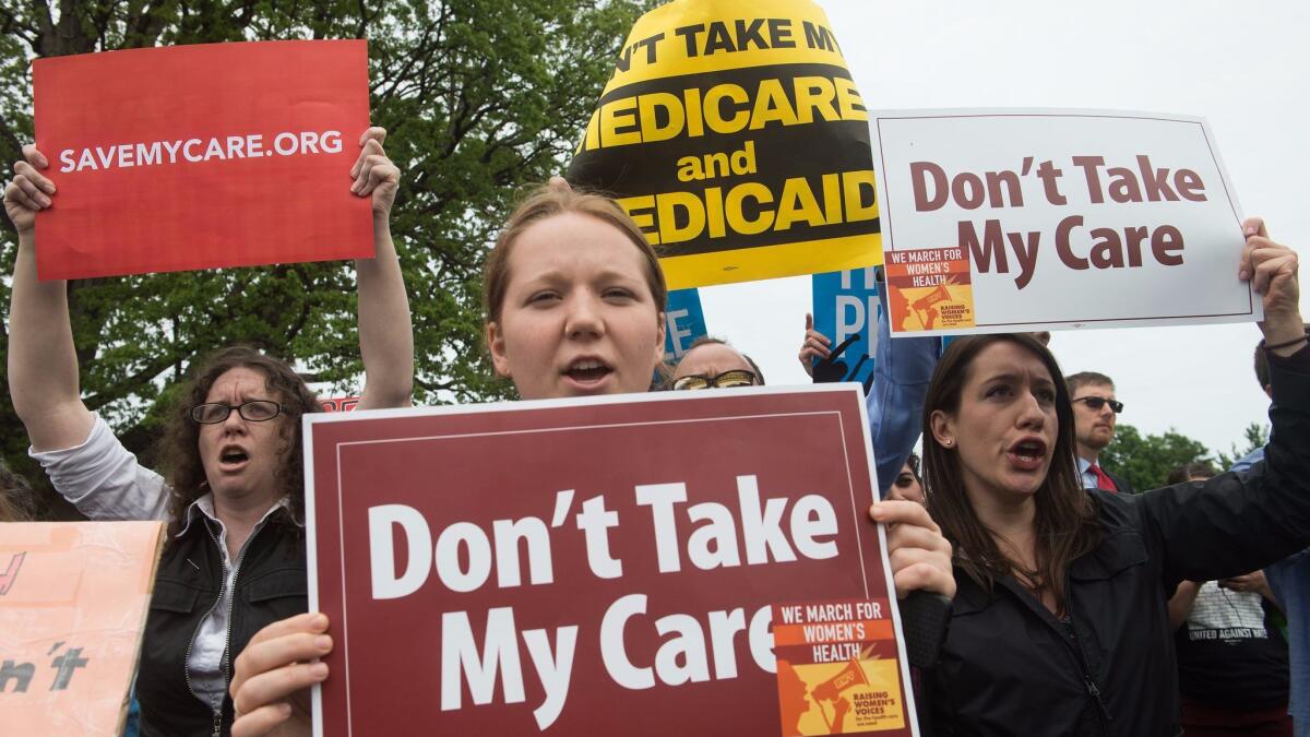Protesters outside the U.S. Capitol on May 4, 2017, after the House of Representatives narrowly passed a bill to replace Obamacare.