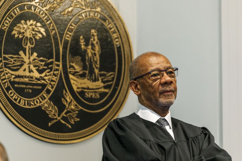 FILE - Judge Clifton Newman stands during a break in the Alex Murdaugh's double murder trial at the Colleton County Courthouse in Walterboro, S.C., on Jan. 27, 2023. Newman told his law school Tuesday, March 28, that he wasn't surprised the jury came back with a guilty verdict in three hours. Murdaugh received a life sentence for killing his wife and son in the six-week trial. (Grace Beahm Alford/The Post And Courier via AP, Pool, File)
