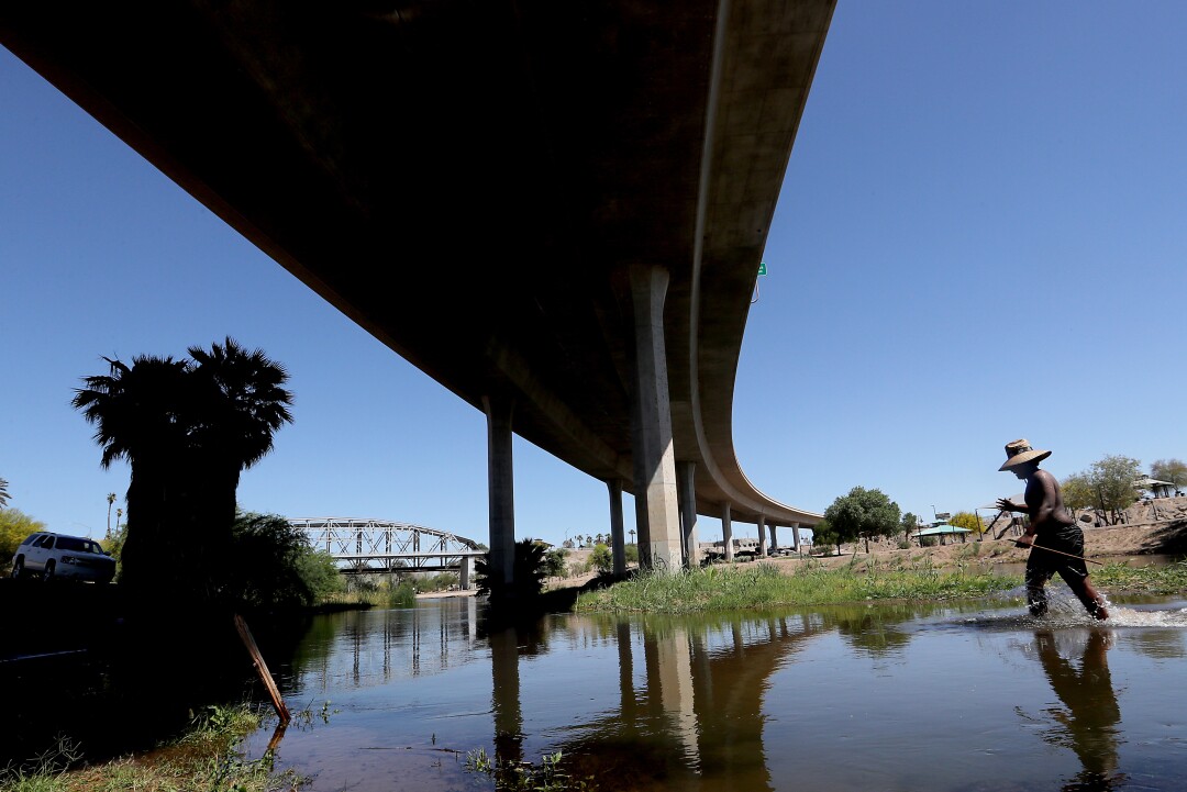 The Colorado River runs shallow enough to wade across in Yuma, Ariz.