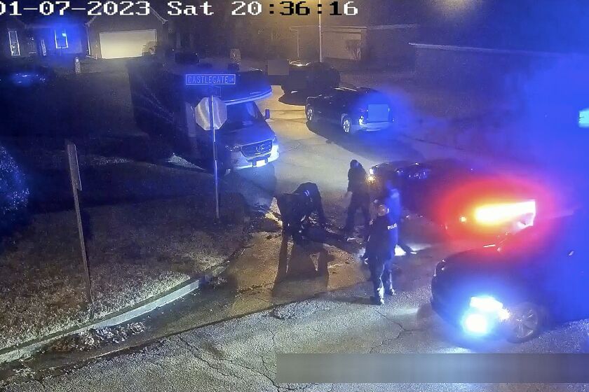 The image from video released on Jan. 27, 2023, and partially redacted by the City of Memphis, shows Tyre Nichols on the ground during a brutal attack by five Memphis police officers on Jan. 7, 2023, in Memphis, Tenn. Nichols died on Jan. 10. The five officers have since been fired and charged with second-degree murder and other offenses. (City of Memphis via AP)