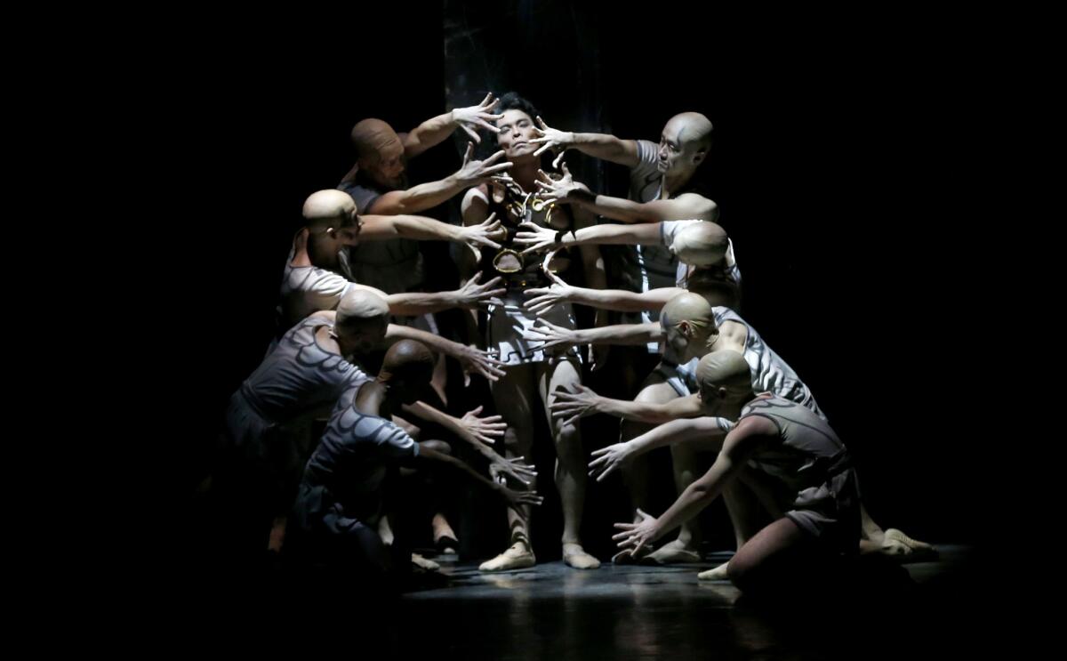 Kenta Shimizu, center, and the dancers of Los Angeles Ballet in "Prodigal Son." (Allen J. Schaben / Los Angeles Times)