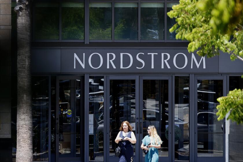 CANOGA PARK-CA-AUGUST 14, 2023: Shoppers exit the Nordstrom at the Westfield Topanga mall on August 14, 2023. Over the weekend a flash mob stormed the store where thousands of dollars in merchandise was stolen. (Christina House / Los Angeles Times)