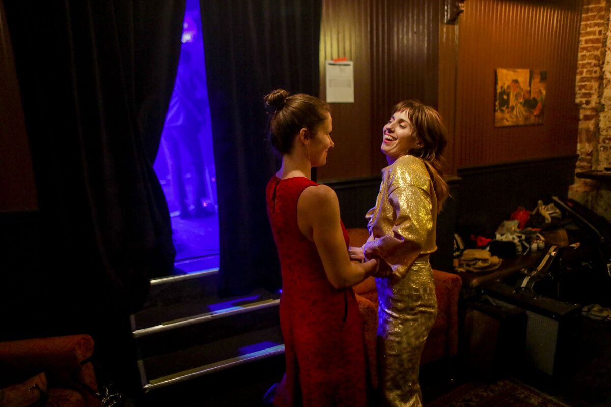 LOS ANGELES, CA, TUESDAY, MARCH 6, 2018 - Meg Remy, right, shares a light moment with fellow U.S. Girls band member Kassie Richardson moments before going on stage to perform at the Moroccan Lounge. (Robert Gauthier/Los Angeles Times)