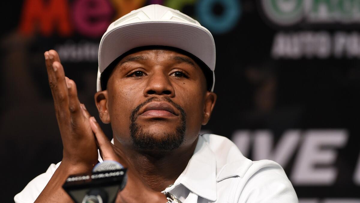 Floyd Mayweather Jr. looks on during a news conference in Las Vegas on Wednesday to promote his Saturday title bout against Marcos Maidana.
