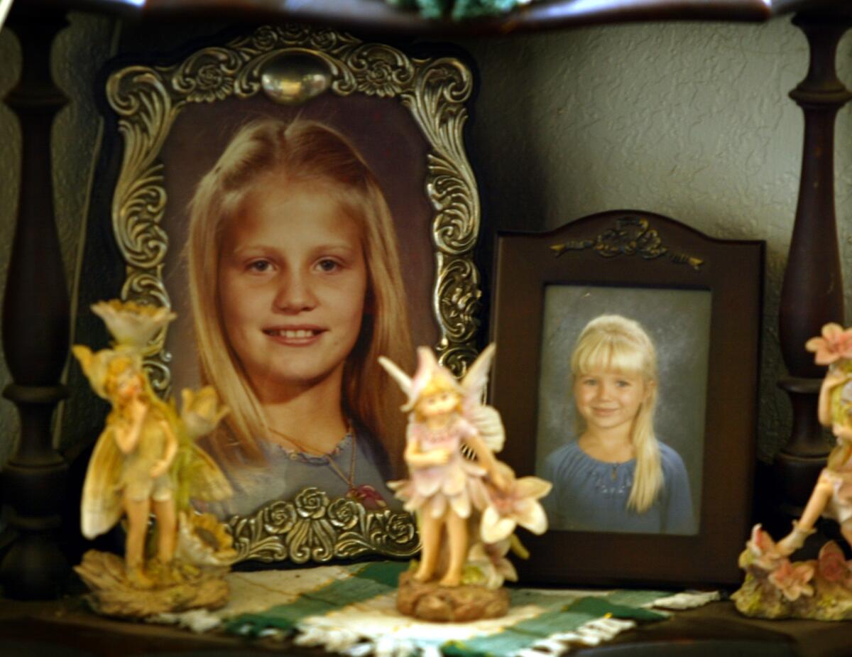 Photos of Robin Samsoe adorn a shelf at her family's home.