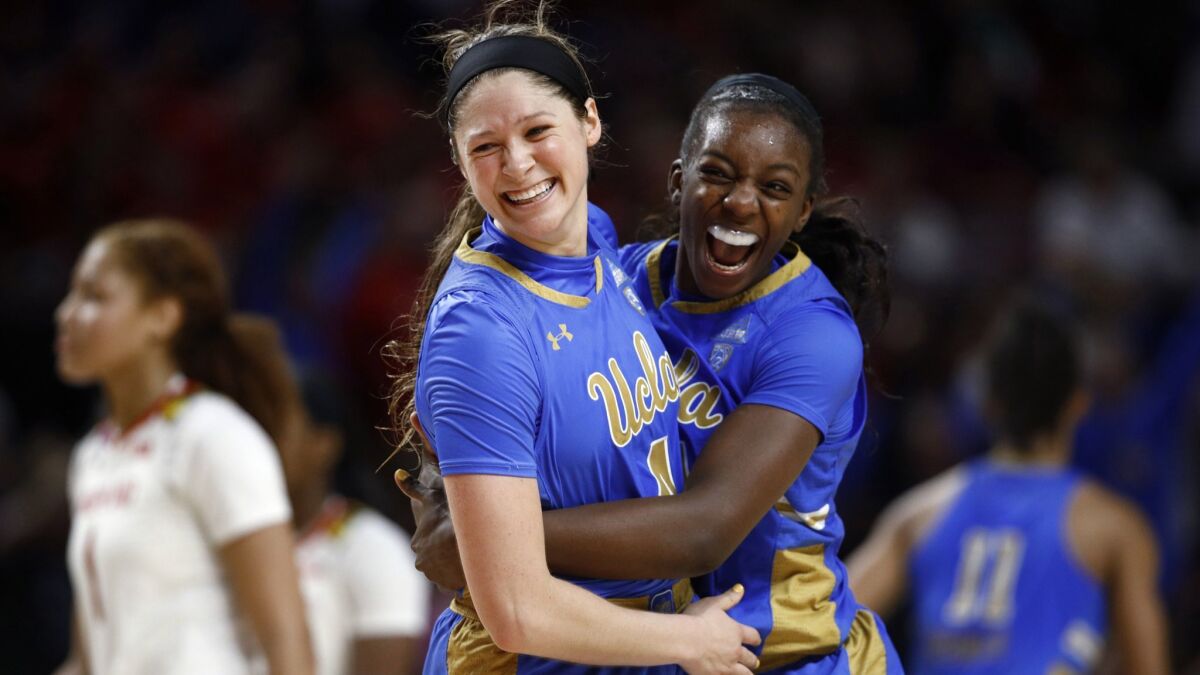 UCLA guard Lindsey Corsaro, left, and forward Michaela Onyenwere celebrate after a second-round game against Maryland in the NCAA women's tournament on Monday in College Park, Md. UCLA won 85-80.
