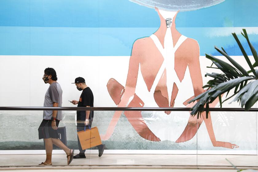 COSTA MESA-CA-JUNE 15, 2021: Shoppers at South Coast Plaza in Costa Mesa on Tuesday, June 15, 2021. (Christina House / Los Angeles Times)