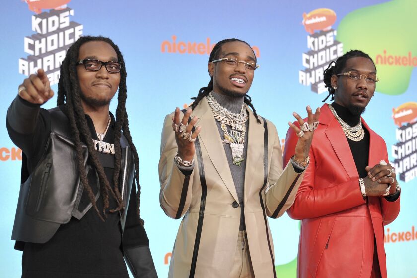 From left, Migos rappers Takeoff Quavo and Offset at the Nickelodeon Kids' Choice Awards 2019 in Los Angeles.