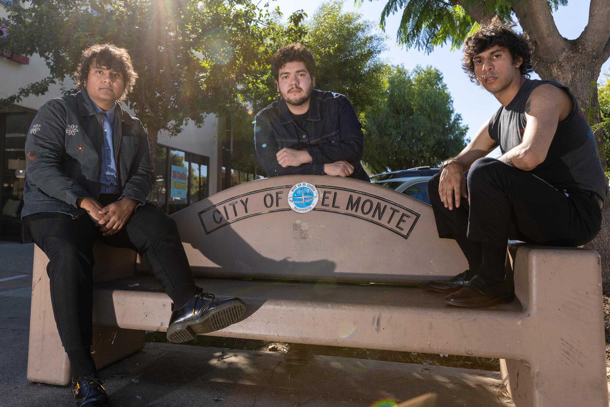 Three men on a bench