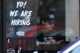 FILE - A hiring sign is displayed at a restaurant in Schaumburg, Ill., April 1, 2022. The white-hot demand for U.S. workers cooled a bit in April, though the number of unfilled jobs remains high and companies are still desperate to hire more people. Employers advertised 11.4 million jobs at the end of April, the Labor Department said Wednesday, June 1, 2022 down from nearly 11.9 million in March, the highest level on records that date back 20 years. (AP Photo/Nam Y. Huh, file)