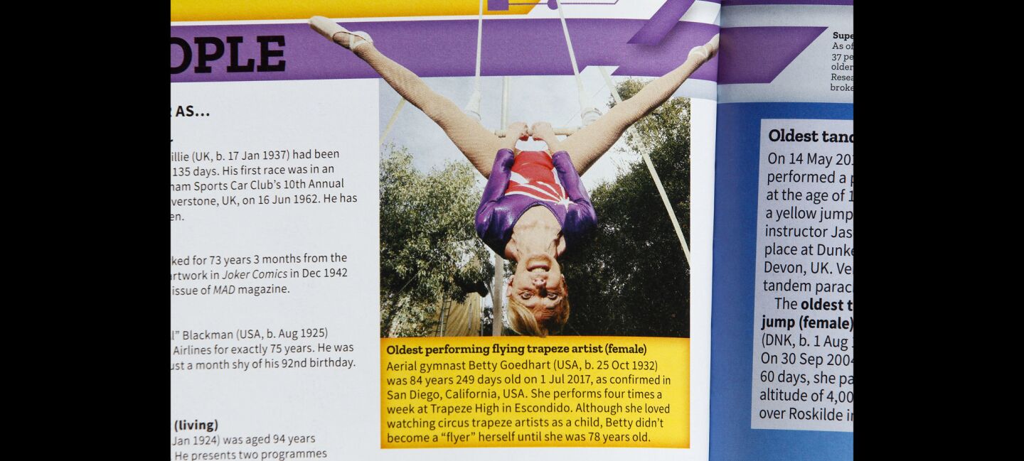 A picture of Betty Goedhart, 85, is in the 2019 Guinness World Records book, which has her listed as the oldest performing female flying trapeze artist.