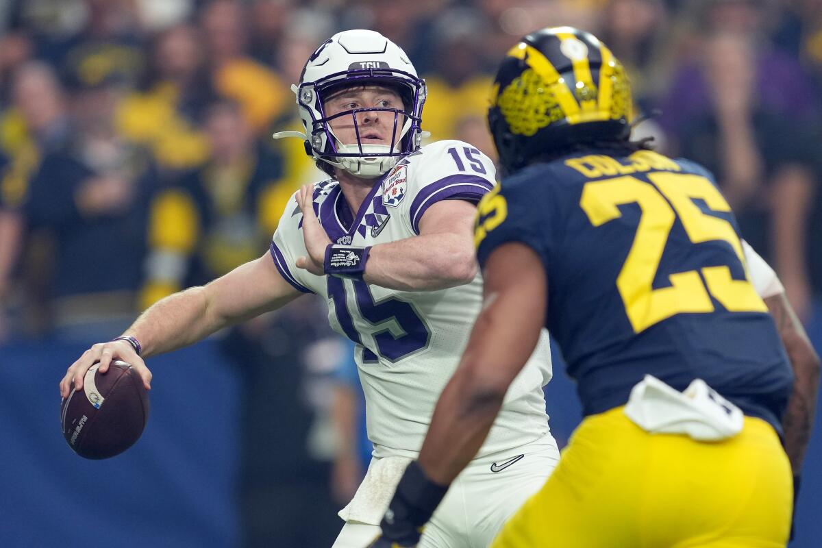 TCU quarterback Max Duggan passes during an upset win in the Fiesta Bowl over Michigan on Dec. 31.