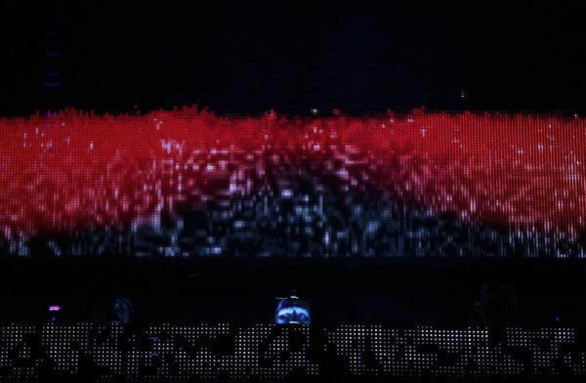 Swedish House Mafia performs at the Masquerade Motel two-day music festival at the Los Angeles State Historic Park. Read the review.