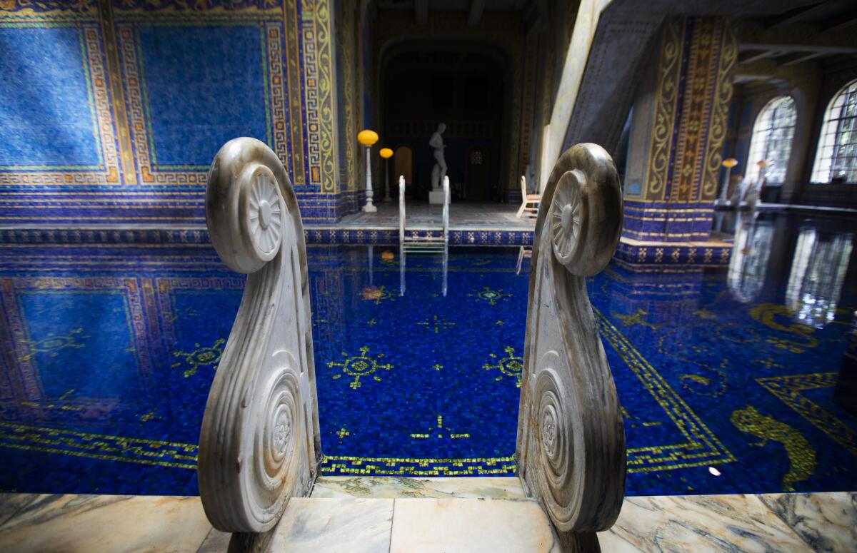 Blue tiles decorate an indoor pool