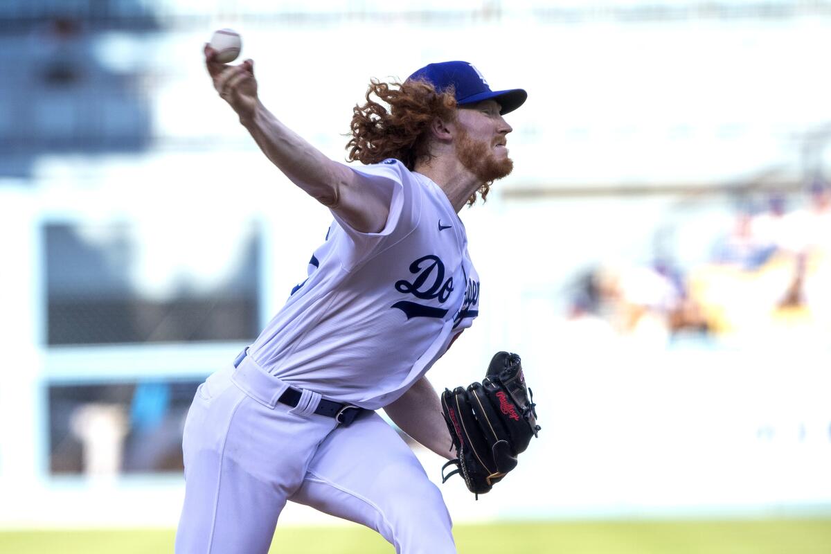 Dodgers starting pitcher Dustin May delivers against the Miami Marlins in the first inning.