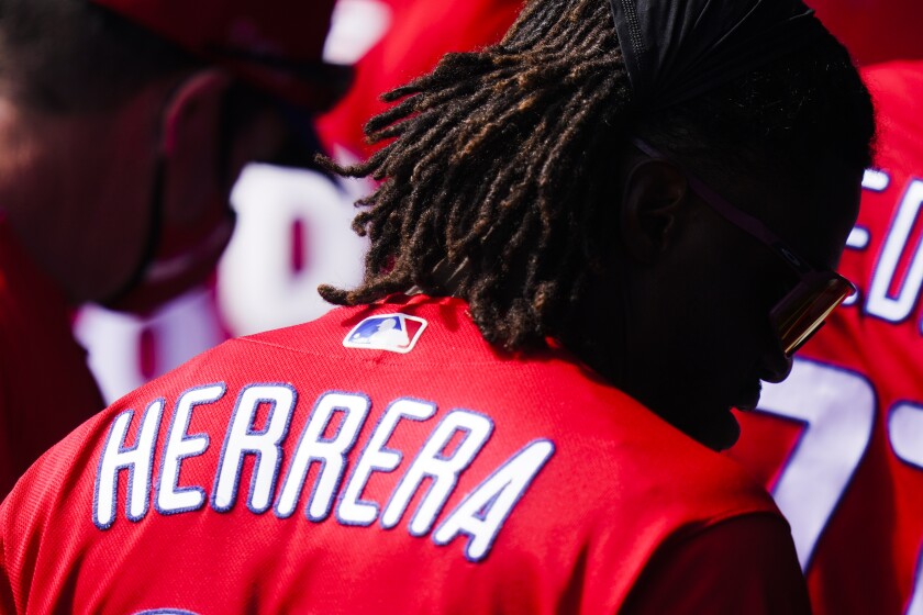 Philadelphia Phillies' Odubel Herrera walks in the dugout during the fourth inning of a spring baseball game against the Toronto Blue Jays, Tuesday, March 2, 2021, in Dunedin, Fla. The Blue Jays won 4-2. (AP Photo/Frank Franklin II)