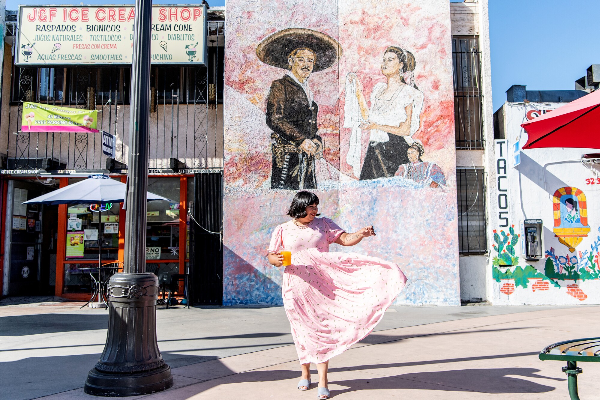 Vanessa Acosta outside J & F Ice Cream Shop in Boyle Heights.