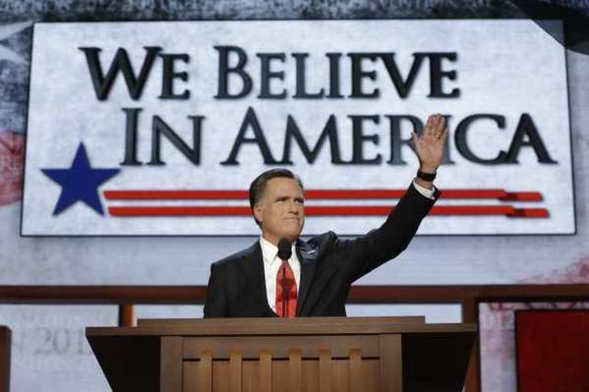 Republican presidential nominee Mitt Romney addresses delegates after speaking at the Republican National Convention in Tampa, Fla., on Aug. 30.