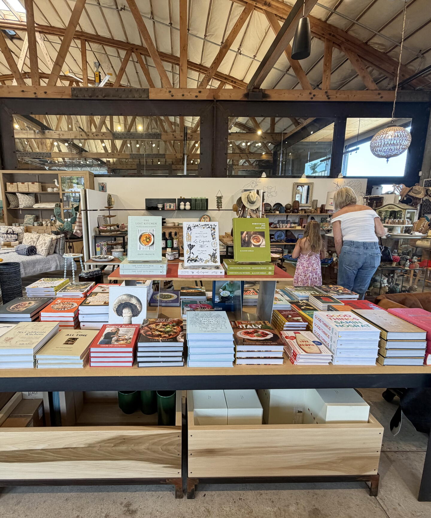 Books stacked on a table in SoLo gift shop