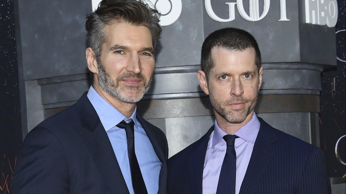 David Benioff, left, and D.B. Weiss attend HBO's "Game of Thrones" final season premiere at Radio City Music Hall in New York.