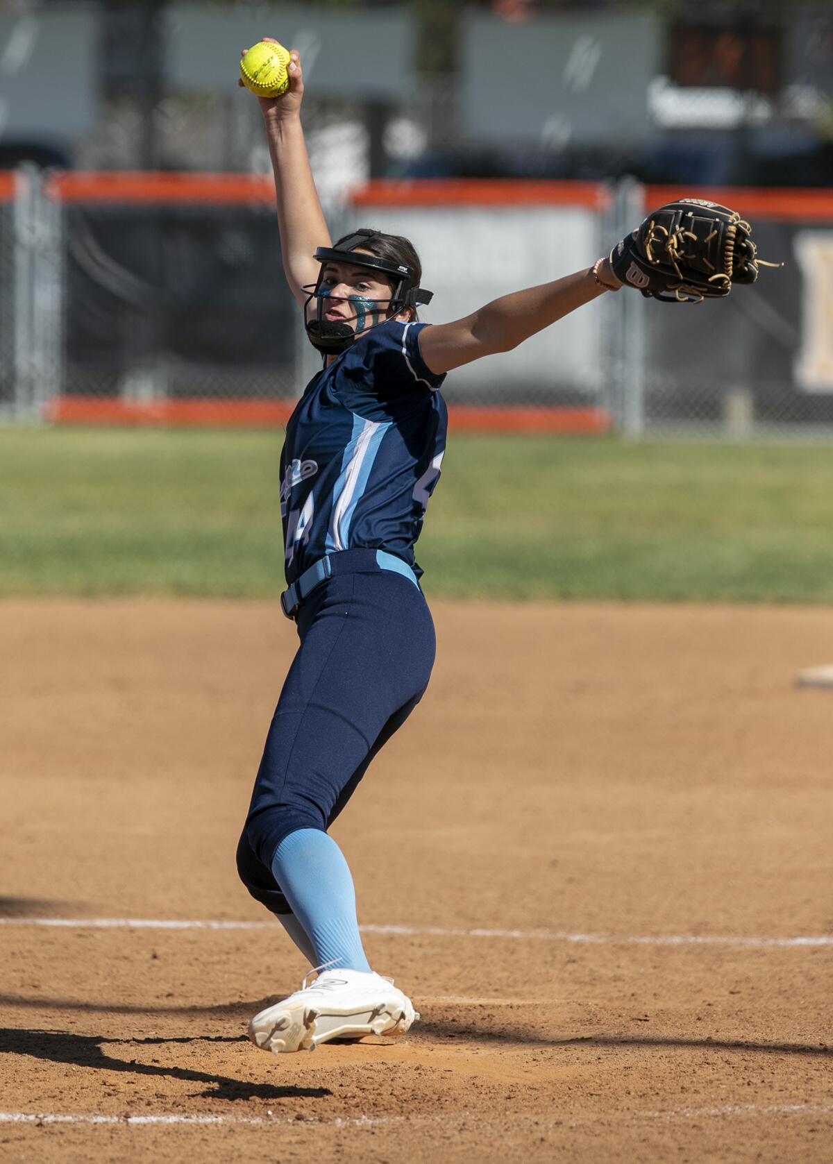 Mia Valbuena pitches during a Surf League game against Huntington Beach on Friday.