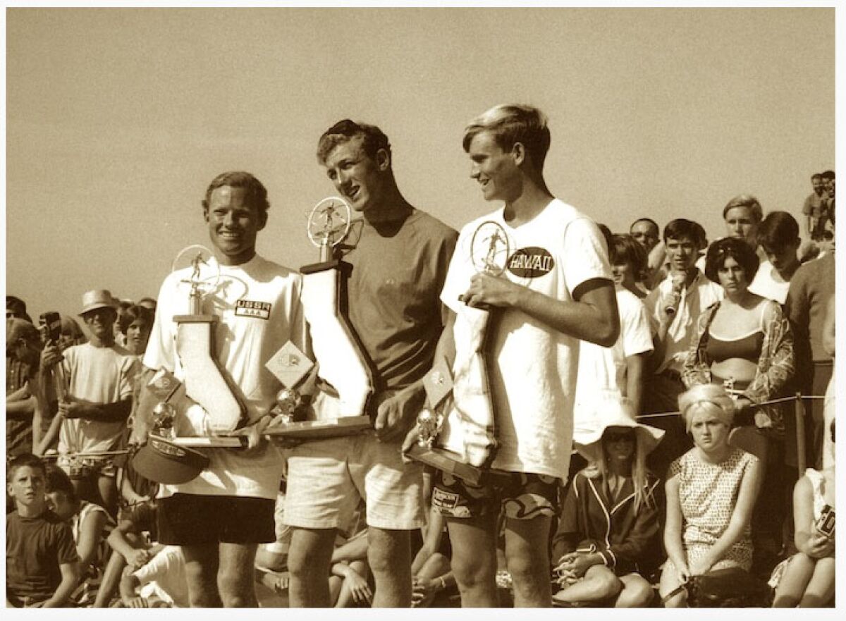 Third-place finisher Corky Carroll, winner Nat Young and runner-up Jock Sutherland at the 1966 World Surfing Championships.