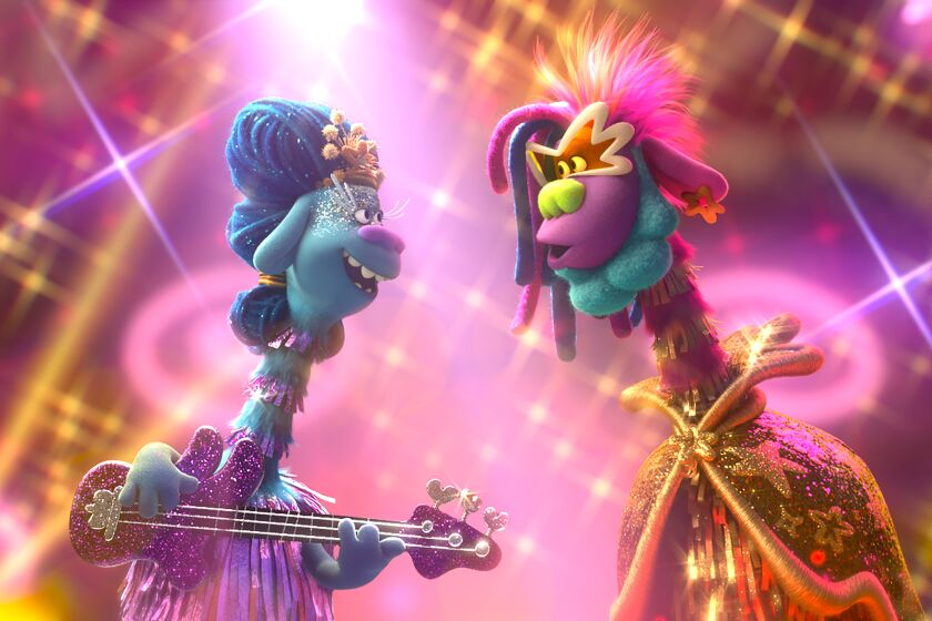 Queen Essence (Mary J. Blige), left, and King Quincy (George Clinton) in DreamWorks Animation's "Trolls World Tour," directed by Walt Dohrn.