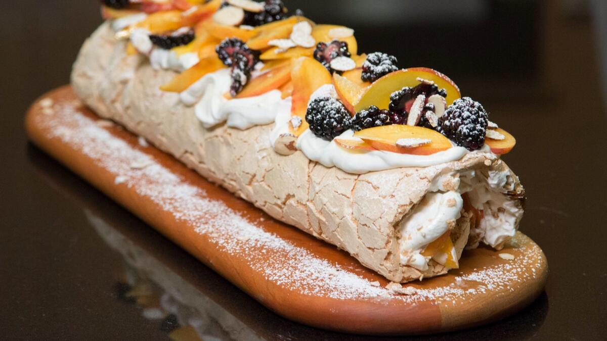 The rolled pavlova with peaches and blackberries from "Sweet," Yotam Ottolenghi's first dessert cookbook.