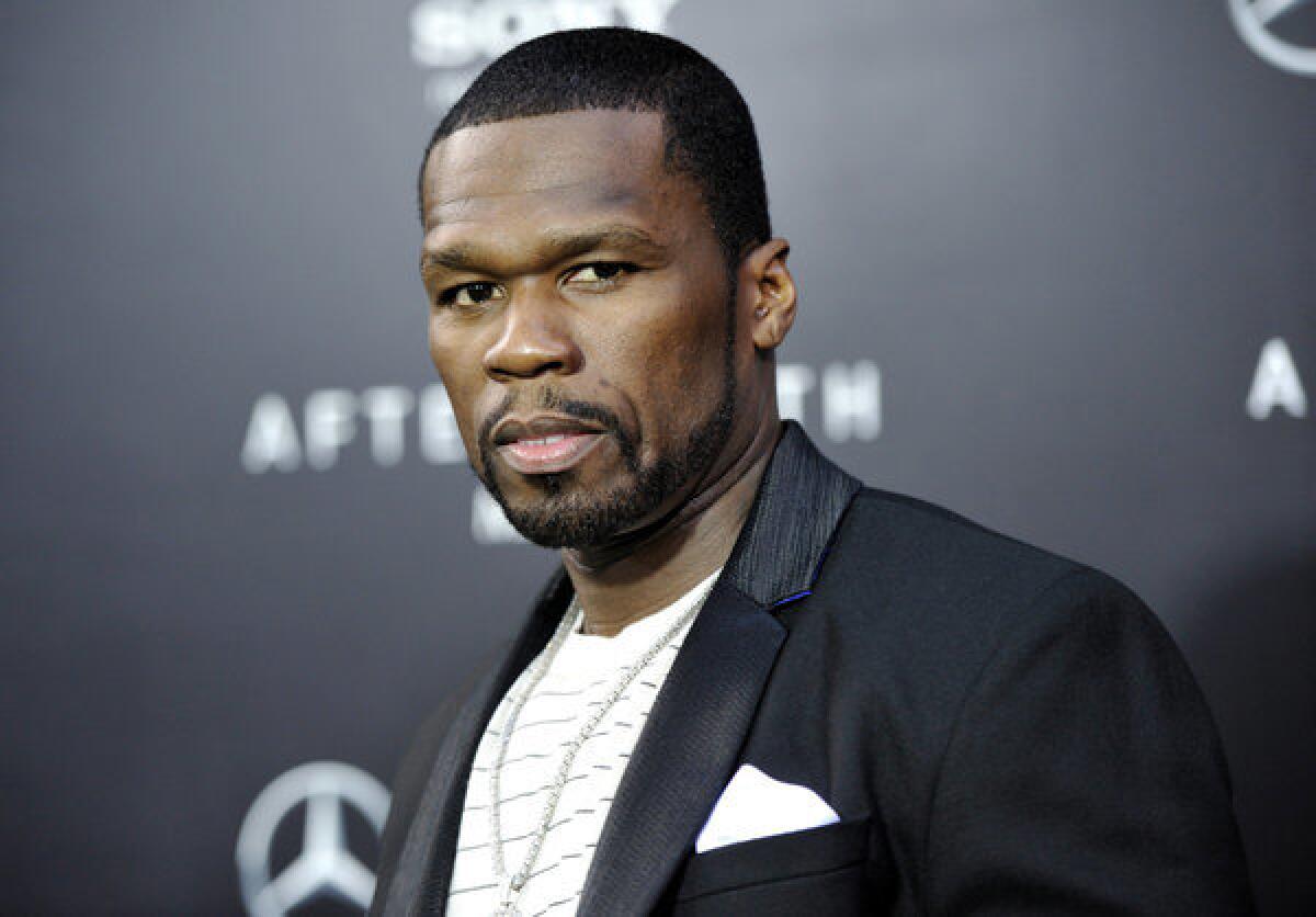 50 Cent says he will donate $750,000 to any charity if Floyd Mayweather Jr., who he reportedly does not like, reads a page of "Harry Potter" aloud.