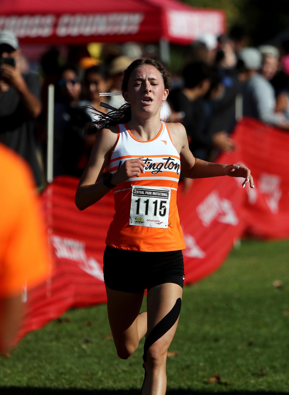 Huntington Beach's Makenzie McRae finishes first in the Central Park Invitational girls' Section 1 race.