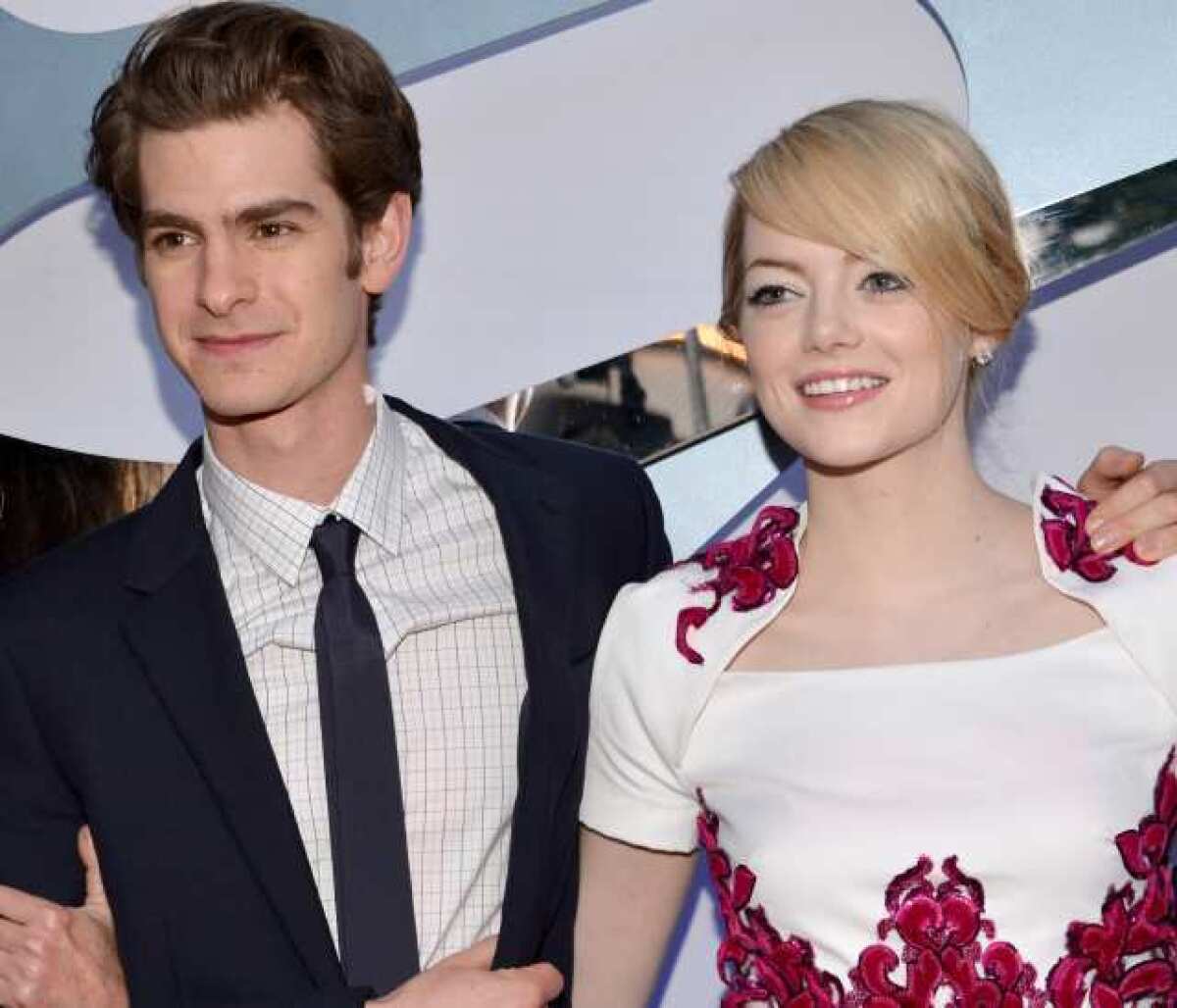 Actors Andrew Garfield and Emma Stone arrive at the premiere of Columbia Pictures' "The Amazing Spider-Man" at the Regency Village Theatre.