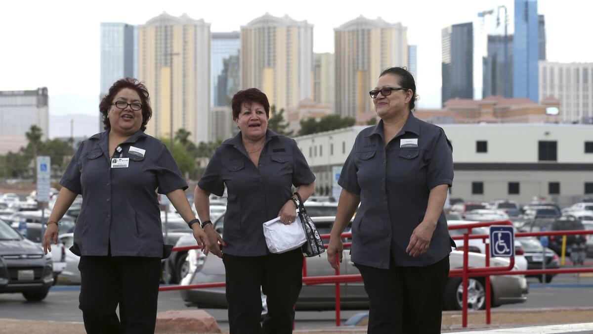 Members of the Culinary Union head into Las Vegas' Thomas & Mack Center on May 22 to vote on authorizing a strike.