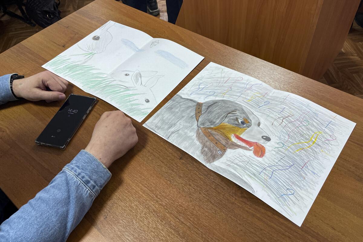 Russian girl's drawings for her father