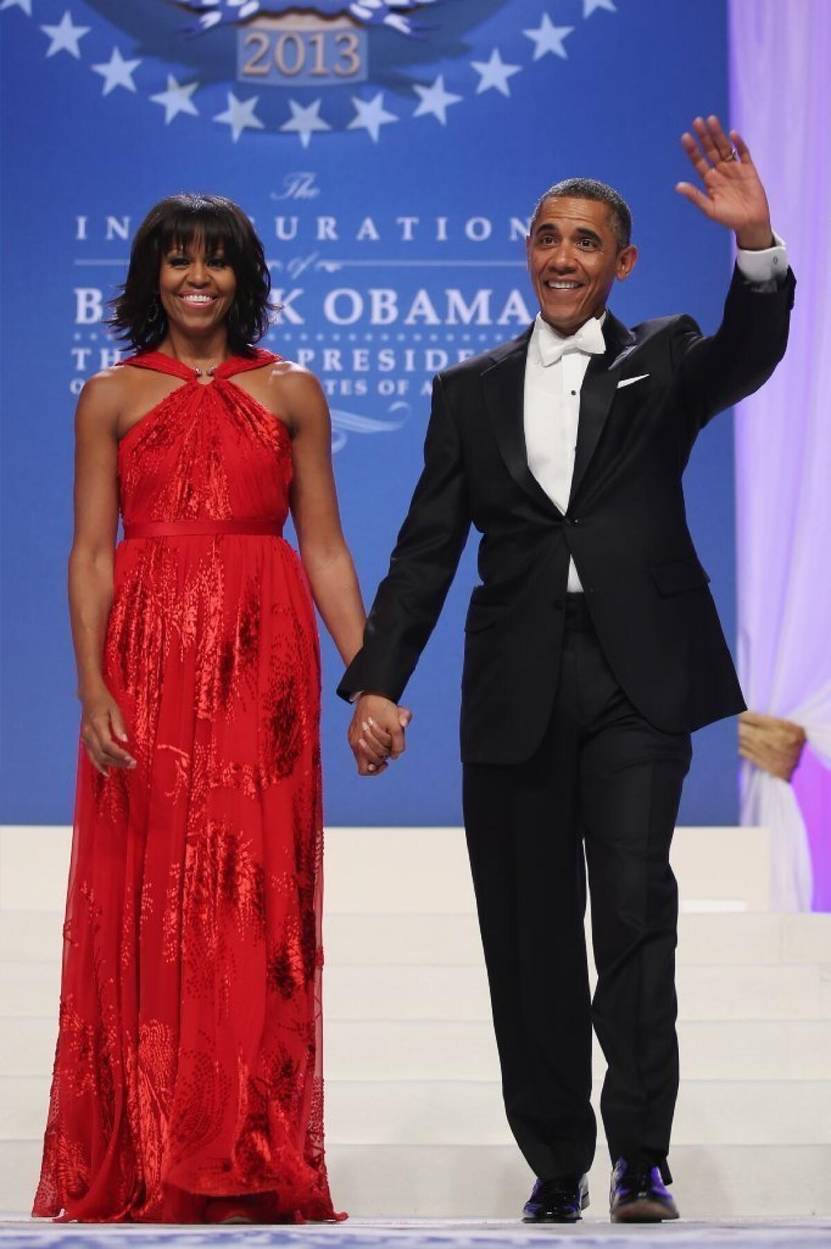 Michelle Obama wears a Jason Wu gown as she and President Obama arrive at the Commander-in-Chief's Inaugural Ball on Monday.